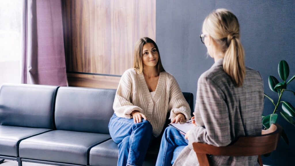 A woman shares her experience during a consultation for adhd treatment in portland