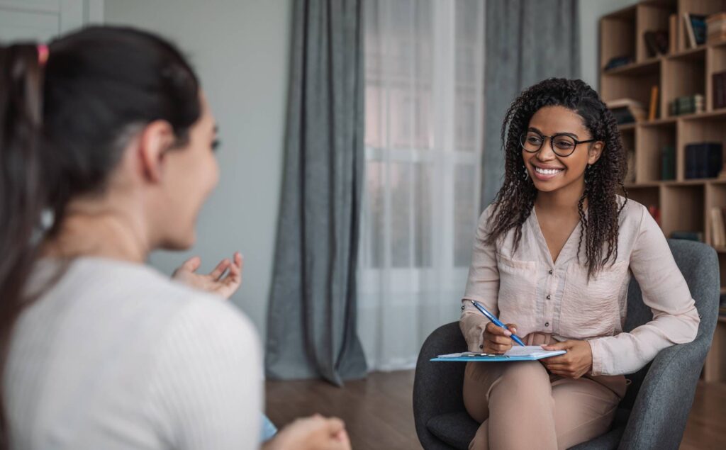 Therapist helping a client with social anxiety disorder treatment in Portland.