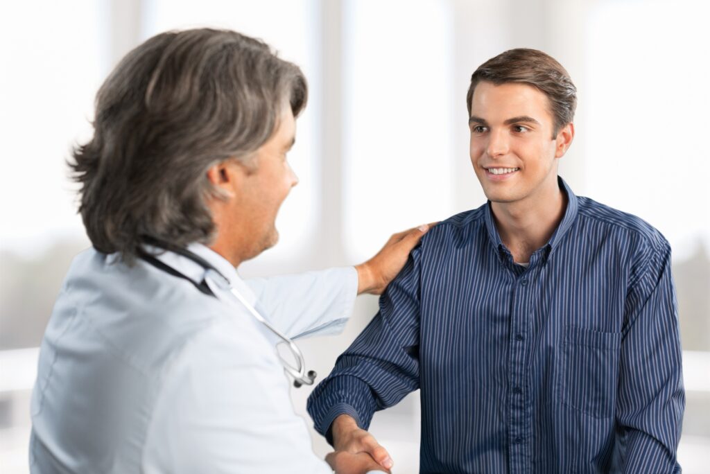 A man talks to his doctor about MAT treatment options at our meth addiction treatment centers in portland. 
