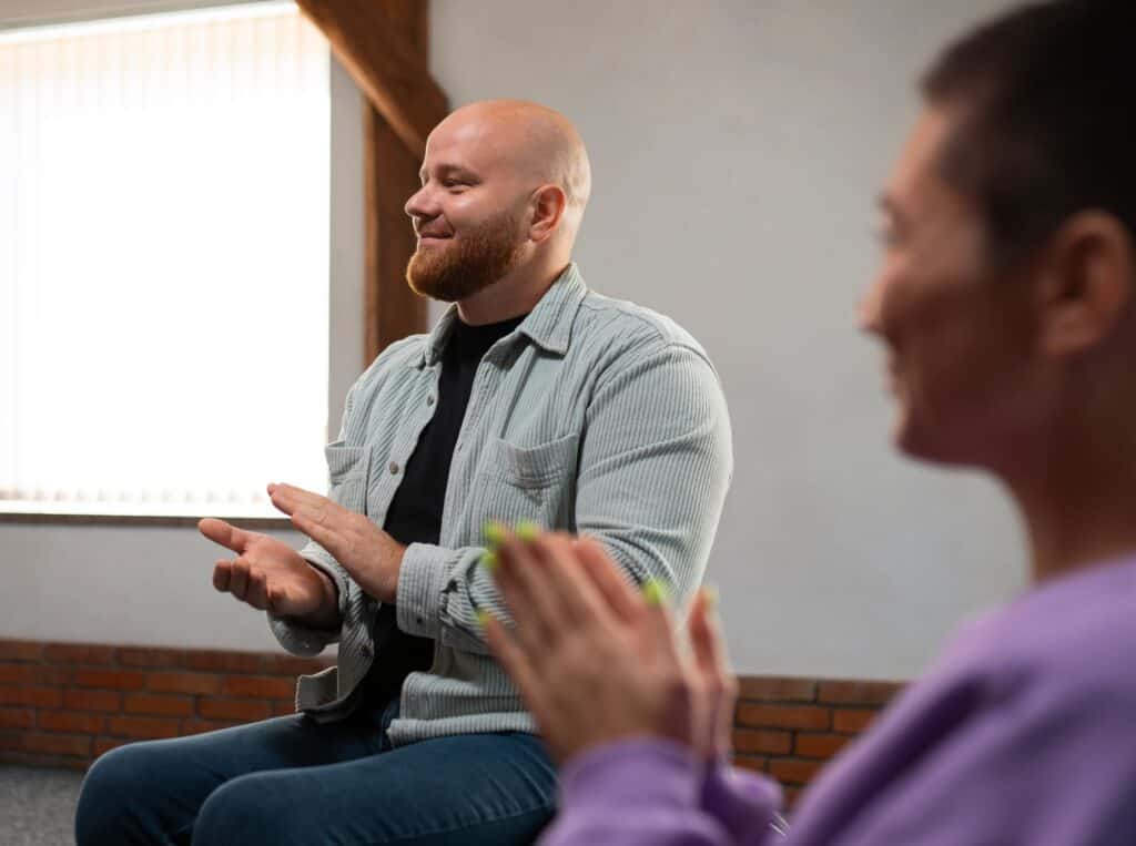 A man enjoys treatment with his Medicare therapist in Portland for opioid use disorder treatment.