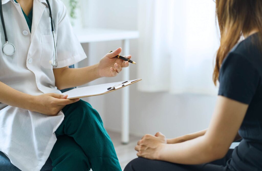Professional providing guidance for cocaine addiction treatment in Portland.