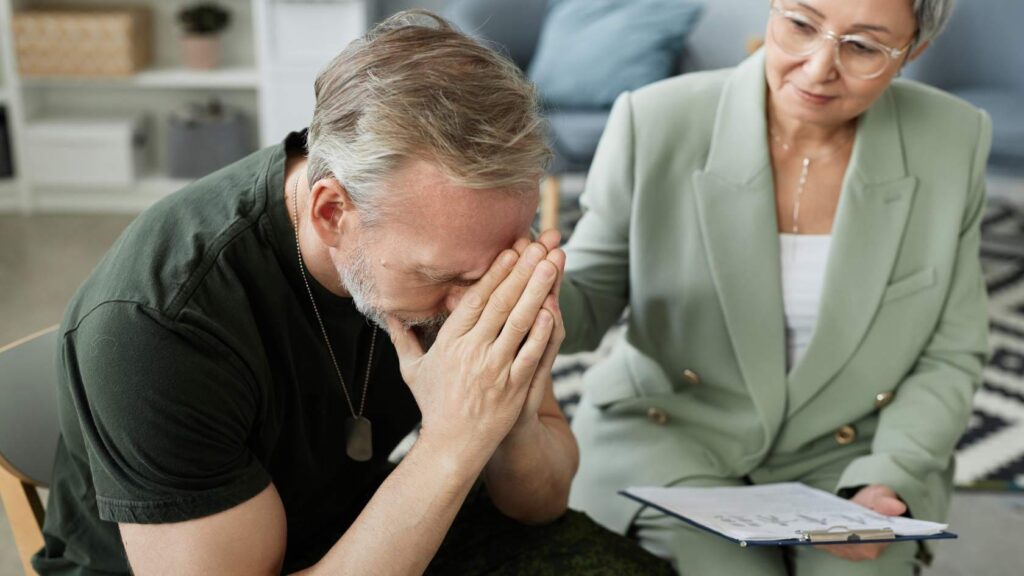 Therapist supporting a man in co-occurring disorder treatment in Portland.