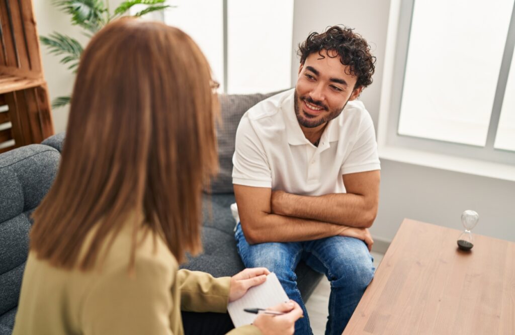 A man enjoys personalized adult psychiatry in Portland.